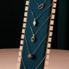 Dark green necklace rack